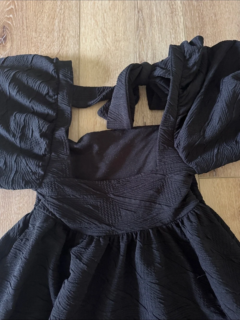 Free People | Black Puff-Sleeve Mini Dress with Tie Back | size XS